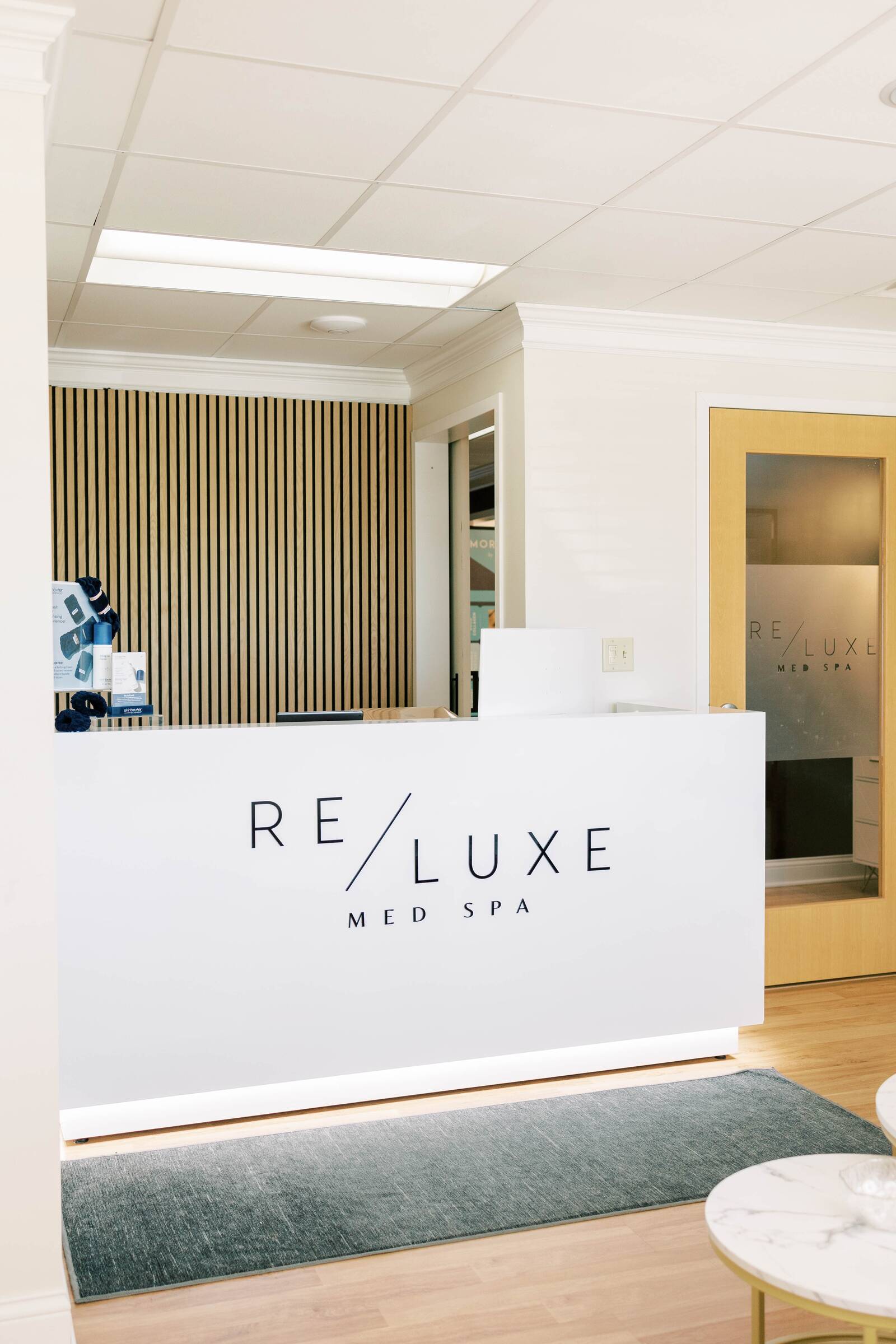 The front desk and retail lounge at RELUXE Med Spa Westfield