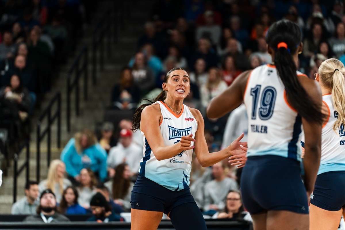 Blake celebrating with teammates during a match